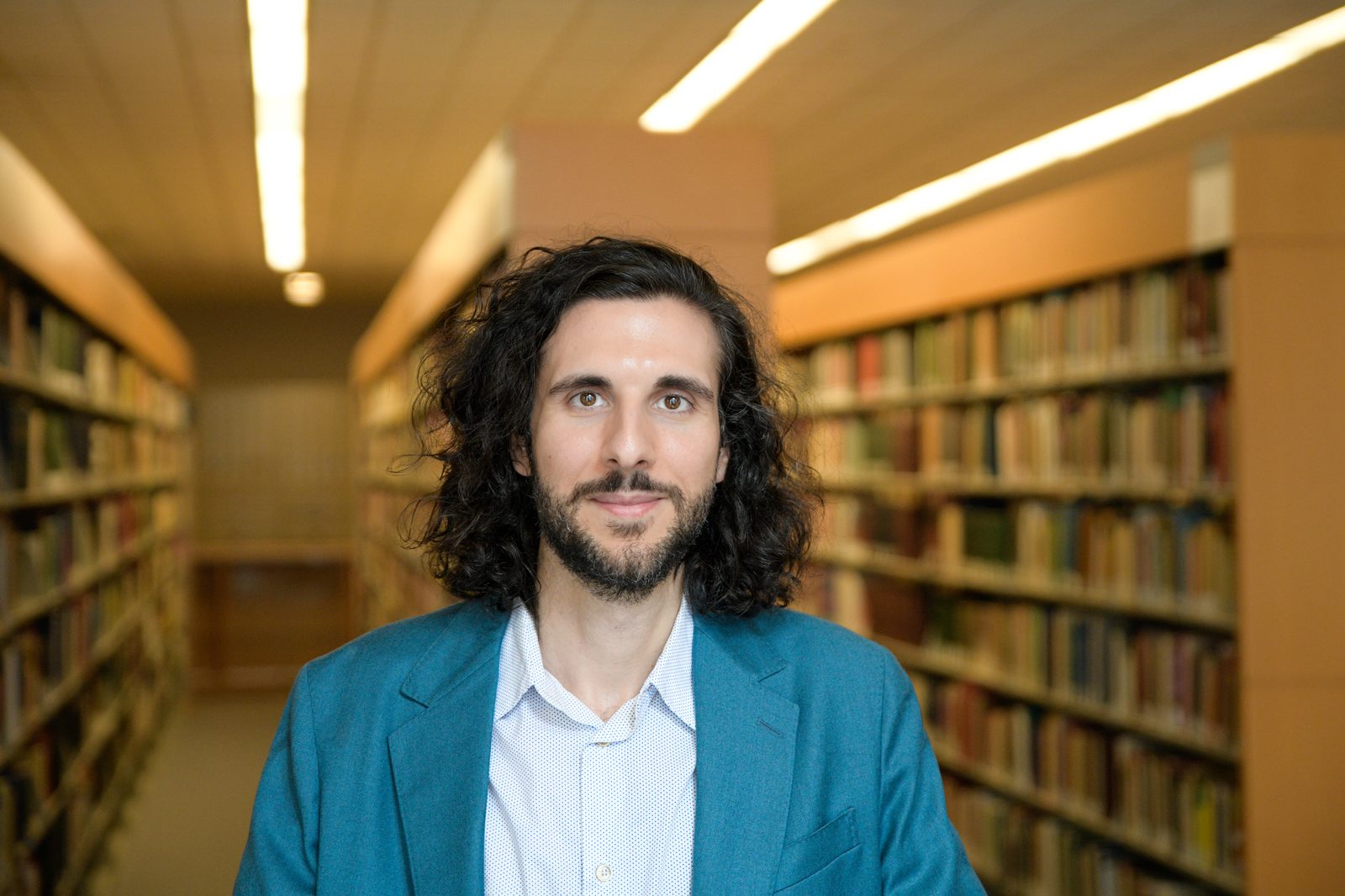 Stefano Morello in a library